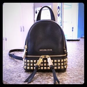 rhea mini studded leather backpack